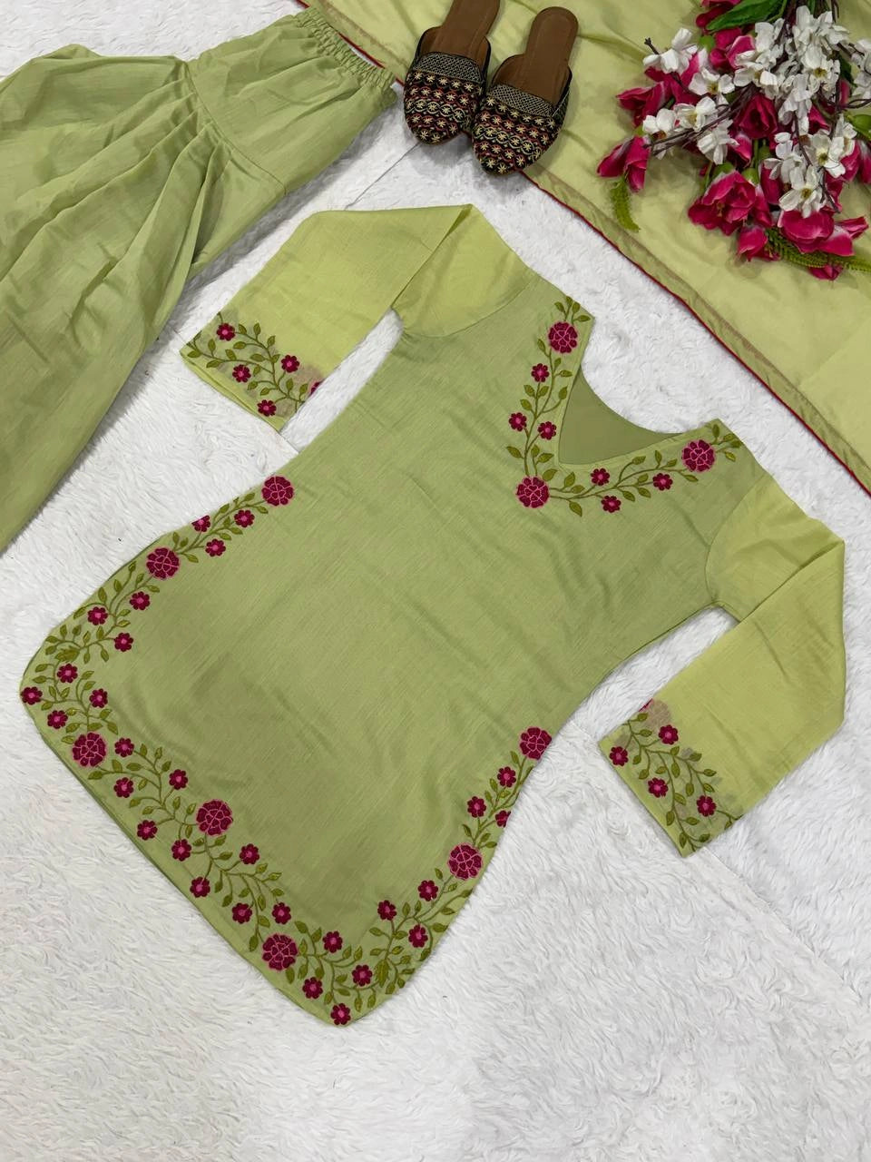 Pista Green Multi Needle Work Suit flat lay angled full set with flowers – Kalyanja KU281