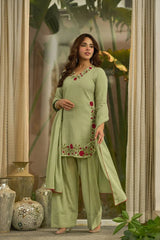 Pista Green Embroidered Farshi Shalwar Suit three quarter angle looking away – Kalyanja KU281