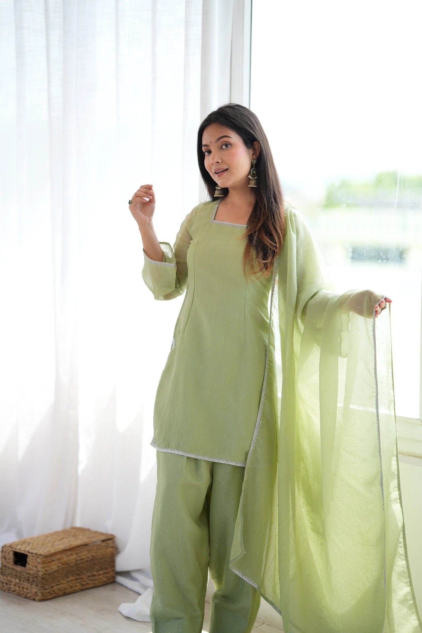 Pista green suit - lace trim neckline close view