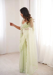 Pista sequins saree – side drape on model