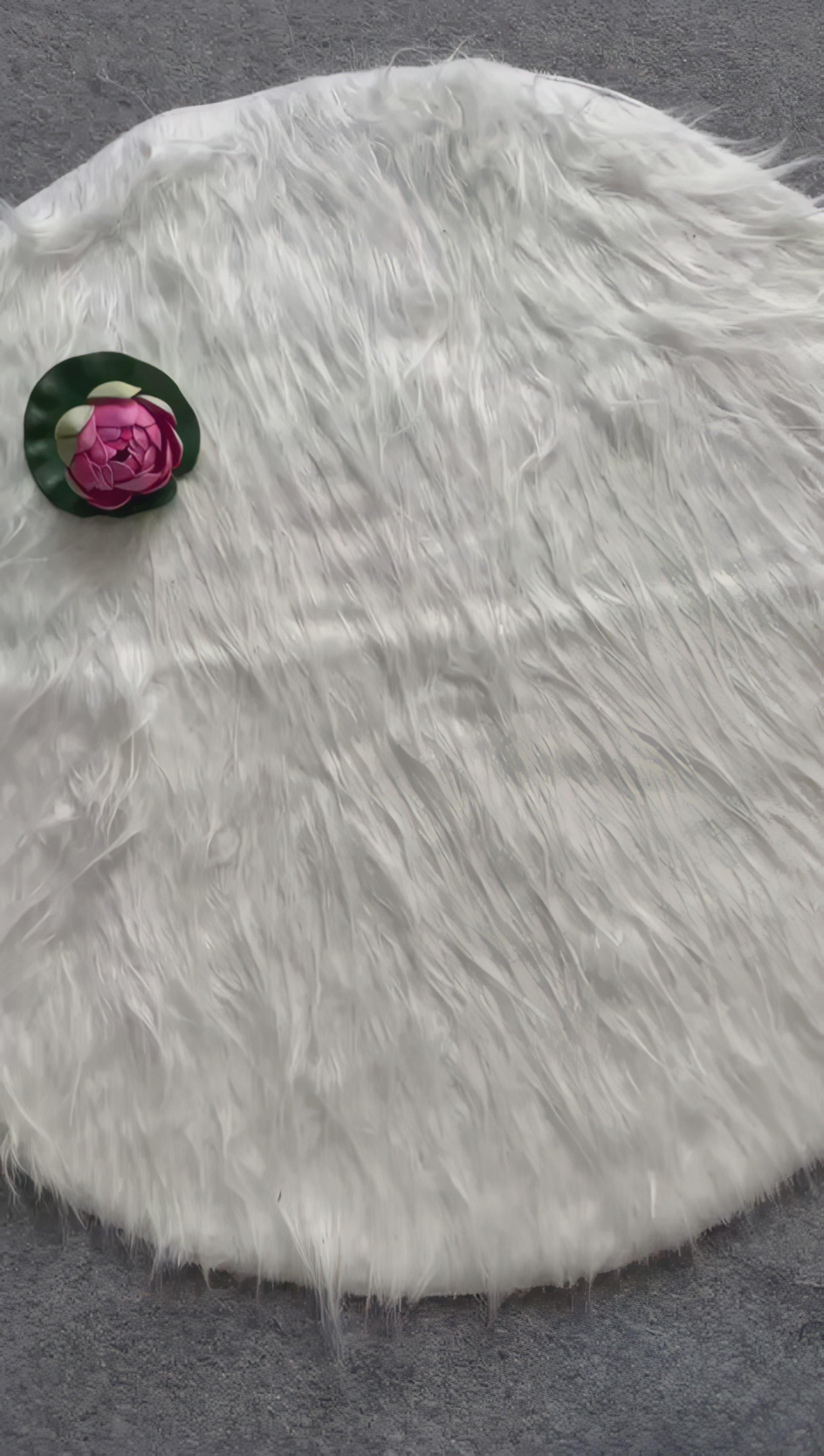  ivory-sequin-sleeveless-blouse-tie-back-floral-prop-white-fur-background