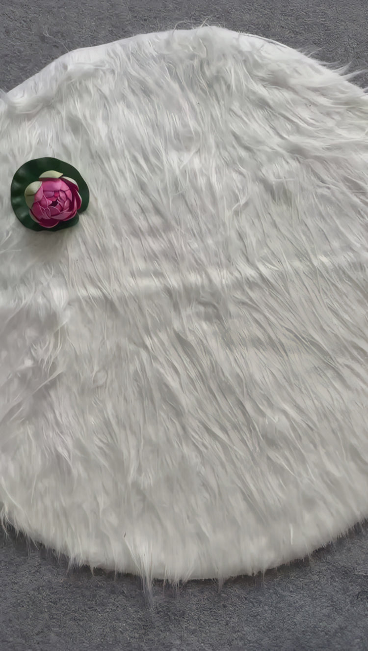  ivory-sequin-sleeveless-blouse-tie-back-floral-prop-white-fur-background