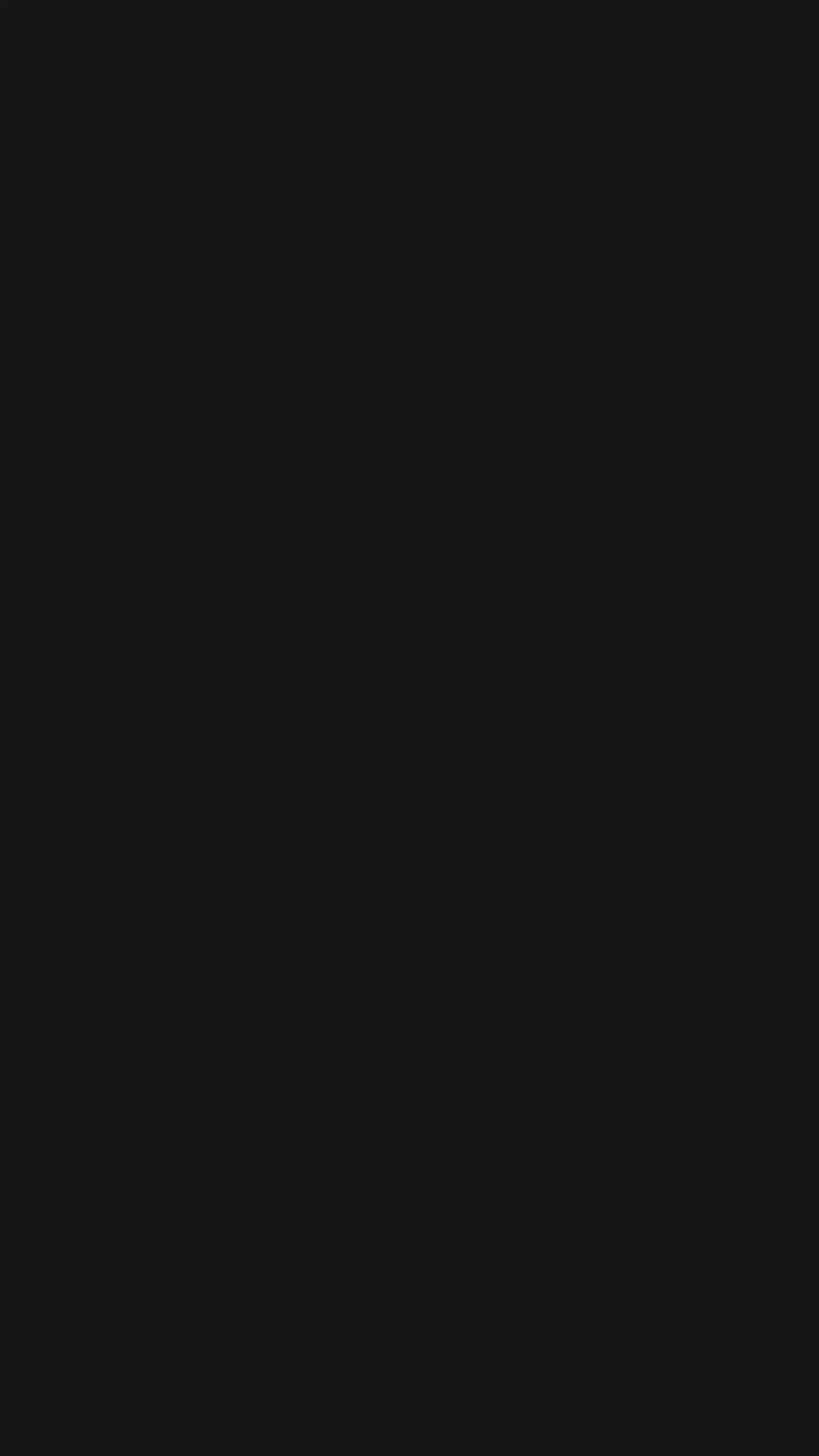 A woman models a vibrant Soft Tussar Silk Saree. The saree is maroon/deep rose pink with a wide, contrasting deep teal border and pallu featuring intricate traditional prints. She wears a teal blouse, a green beaded necklace, and is posed in a garden setting.