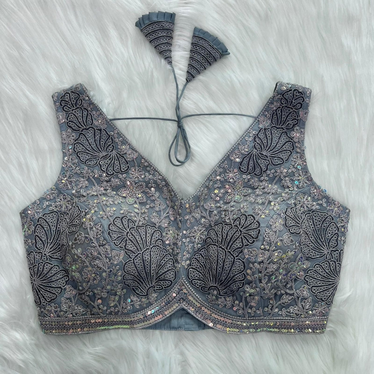 sequin-embroidery-blouse-floral-leaf-tieback-flatlay