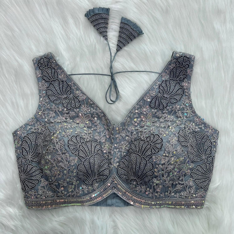 sequin-embroidery-blouse-floral-leaf-tieback-flatlay