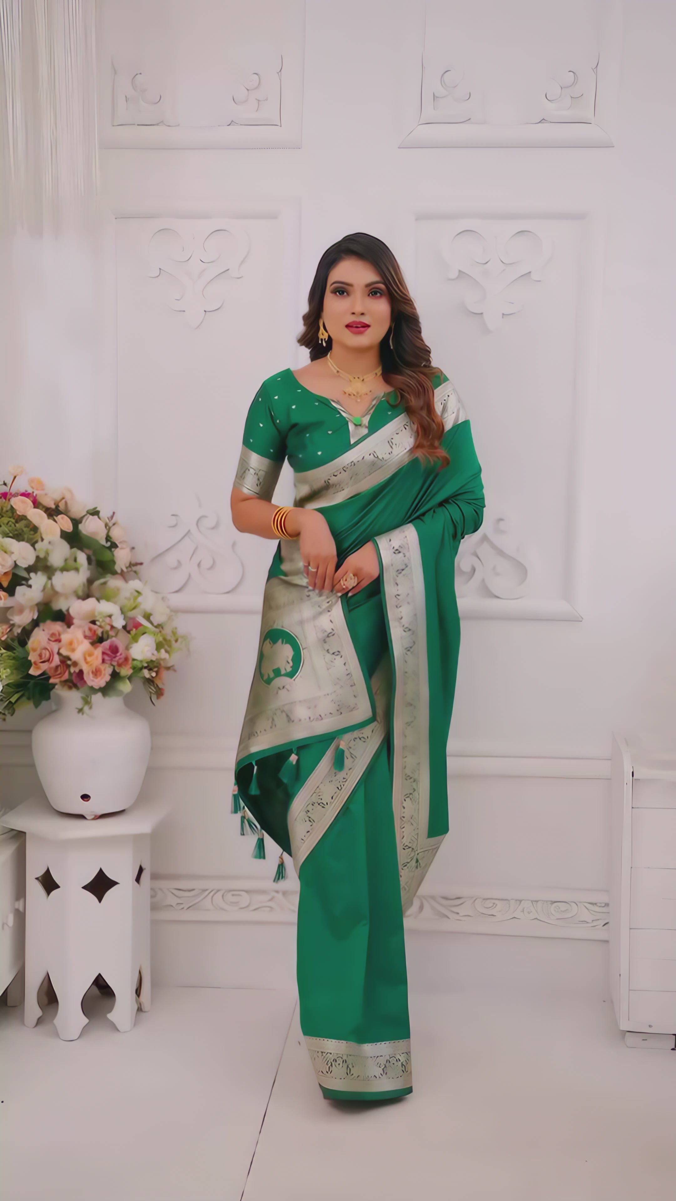 emerald-green-silk-saree-silver-border-floral-room