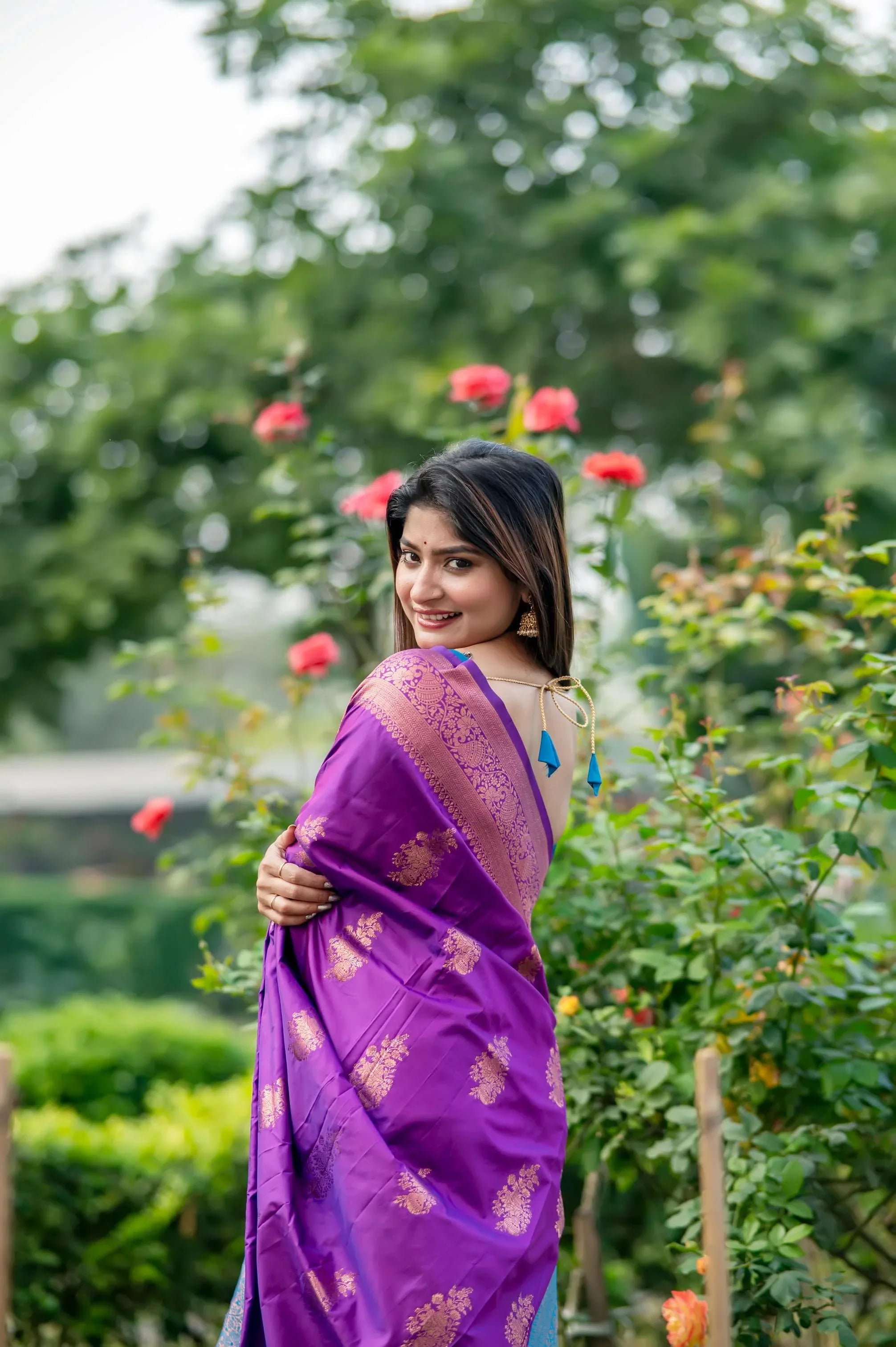 Purple saree with zari work and contrasting border design