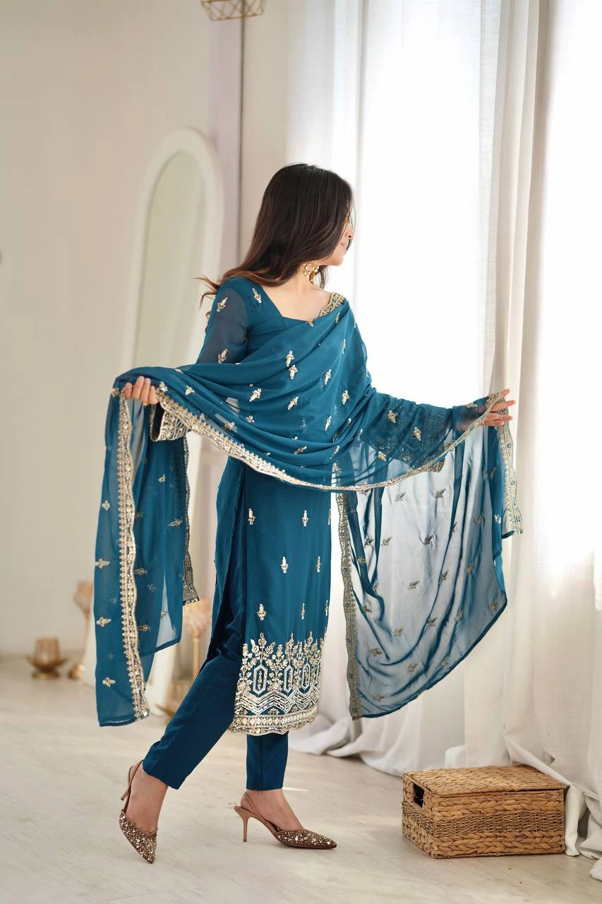 Rama Blue suit side back view showing dupatta and hem embroidery detail
