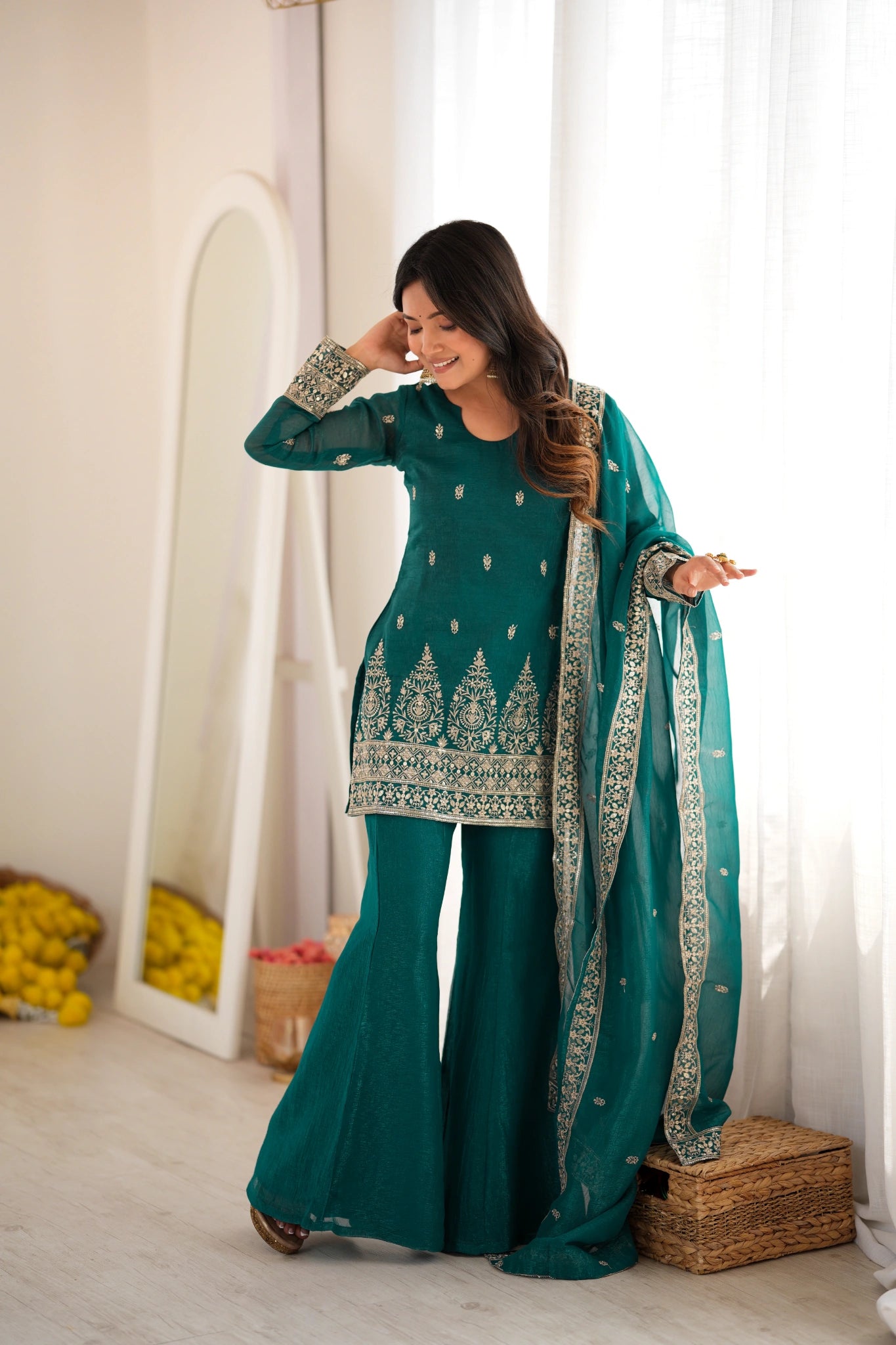 Rama sequins embroidered with zari work suit with bell bottom pant and dupatta - front view