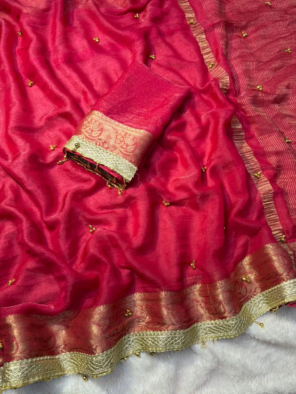 Rani Pink fendy chiffon saree with moti lace border and blouse piece
