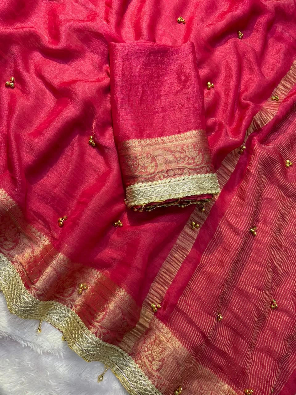 Rani Pink saree ghungroo bells and lace border close view