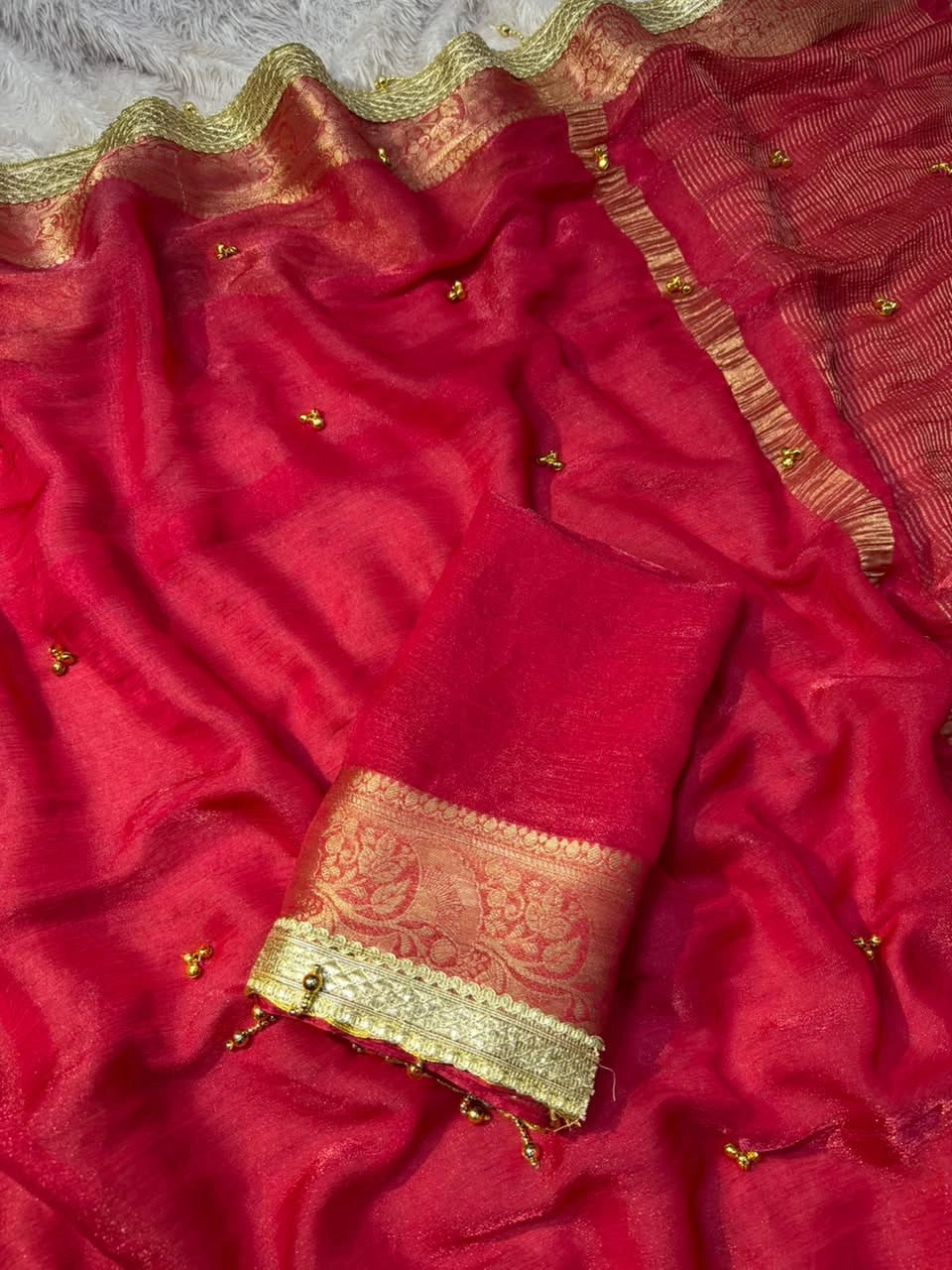 Rani Pink chiffon saree draped with running blouse piece