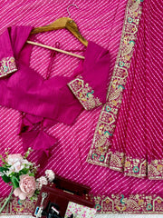 Rani pink leheriya saree with hanger blouse – flat lay
