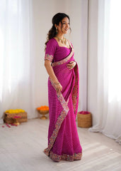 Rani pink leheriya print saree – side view on model