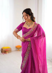 Rani pink wedding wear saree – embroidered pallu on model