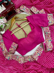 Rani pink saree embroidered border and blouse – styled flat lay