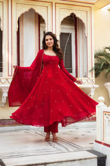 Red Embroidered Butti Anarkali Suit front view smiling model Faux Georgette KU290