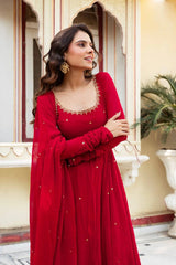 Red Anarkali Suit close up portrait showing round neckline leaf embroidery trim detail
