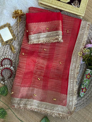 Red saree folded with lace blouse piece styled flat lay – Kalyanja KS406