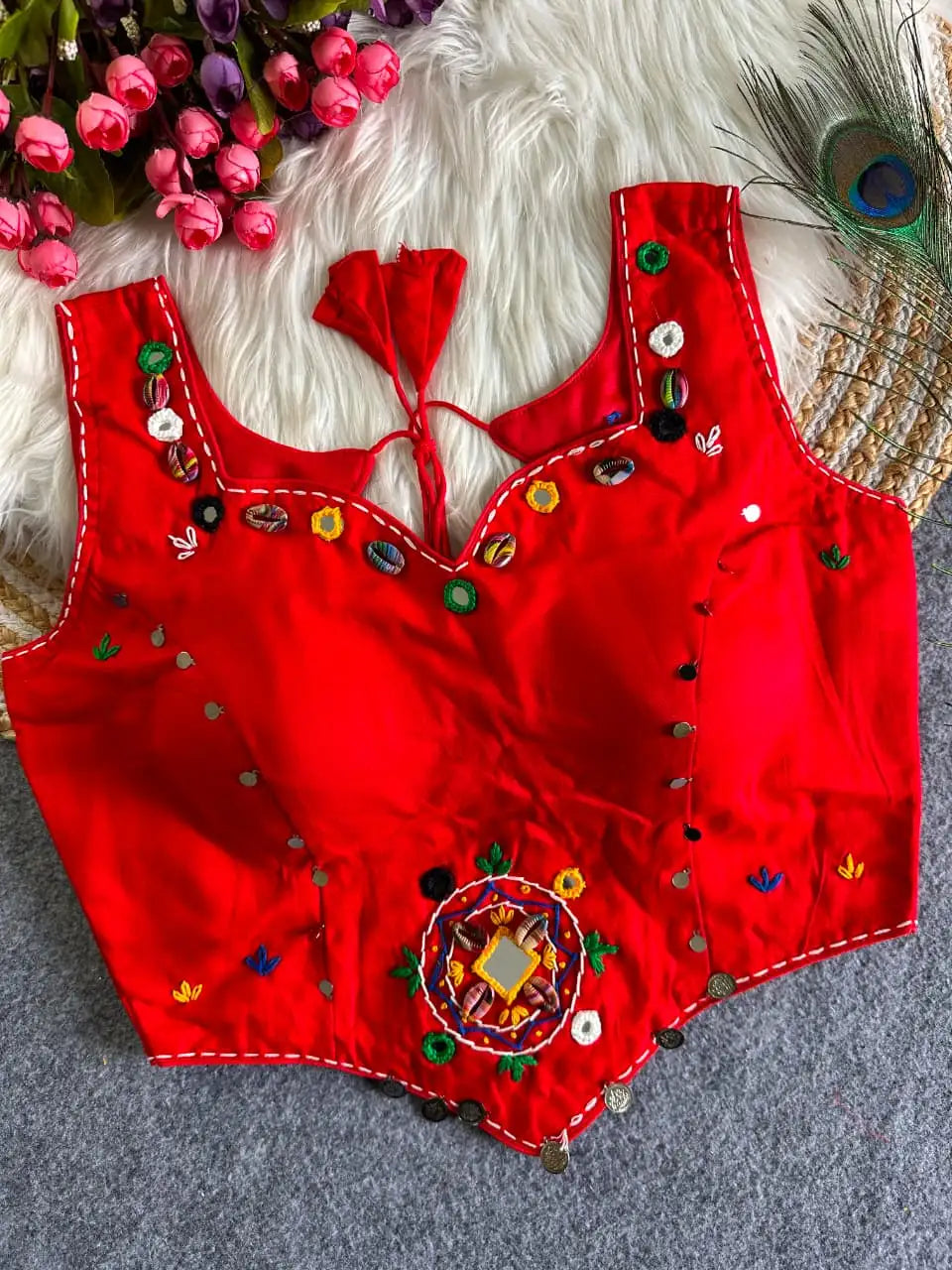 Red Multi Thread Mirror Work Blouse – front flat lay showing sweetheart neckline with cowrie shells and mirror embellishments