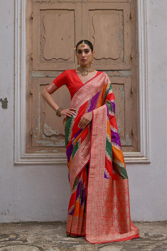 Red saree with Kadwa style weaving and multicolor stripes
