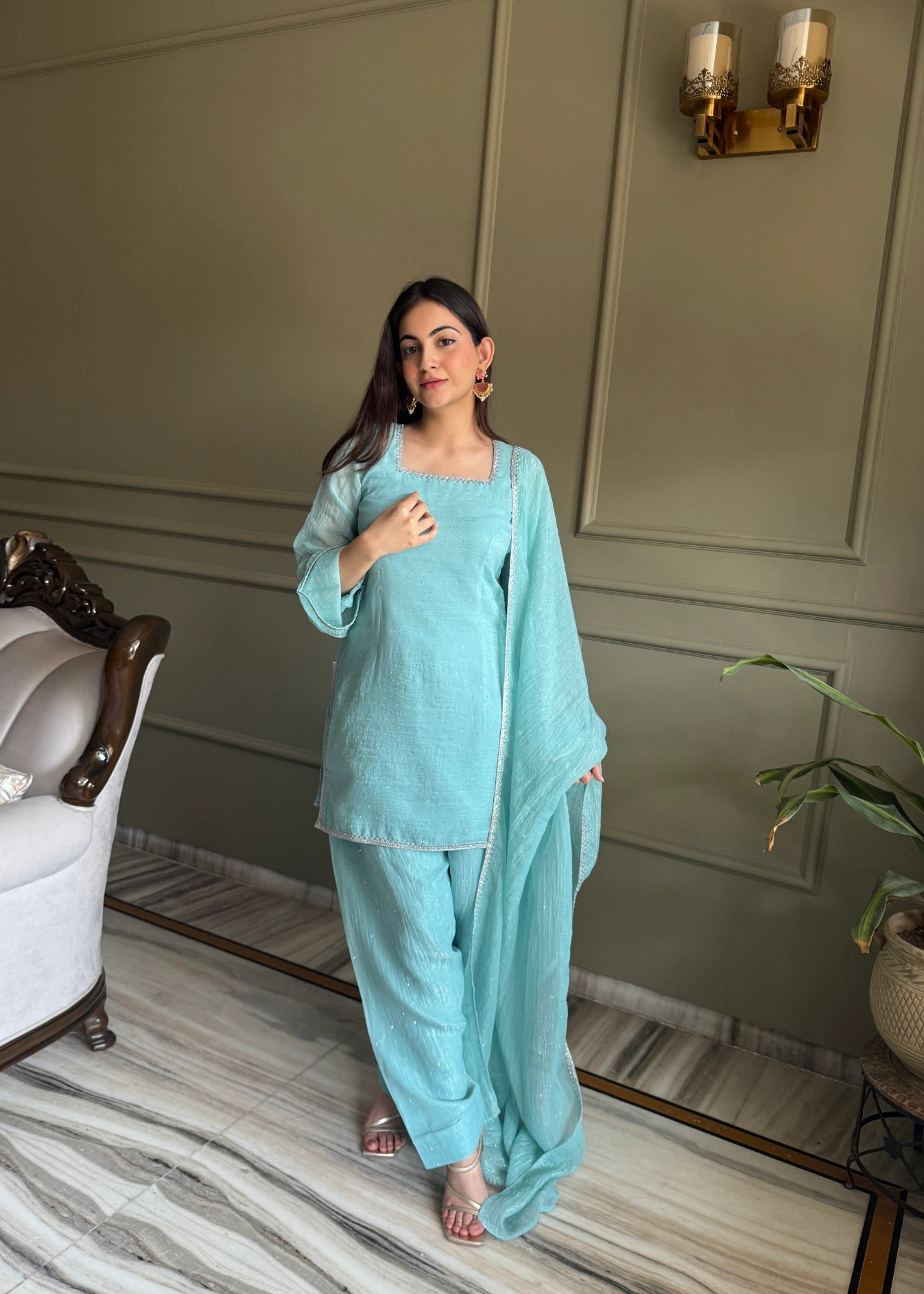 Sky blue suit with lace border dupatta - side pose