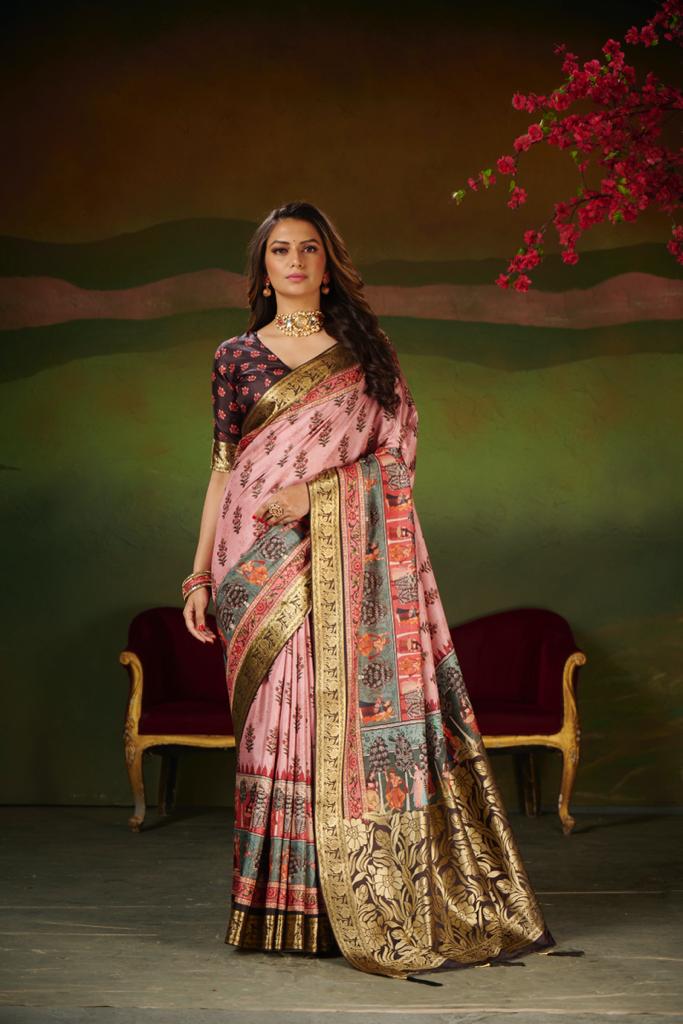 woman wearing soft pink jacquard work silk saree with intricate border and ethnic blouse in royal setting