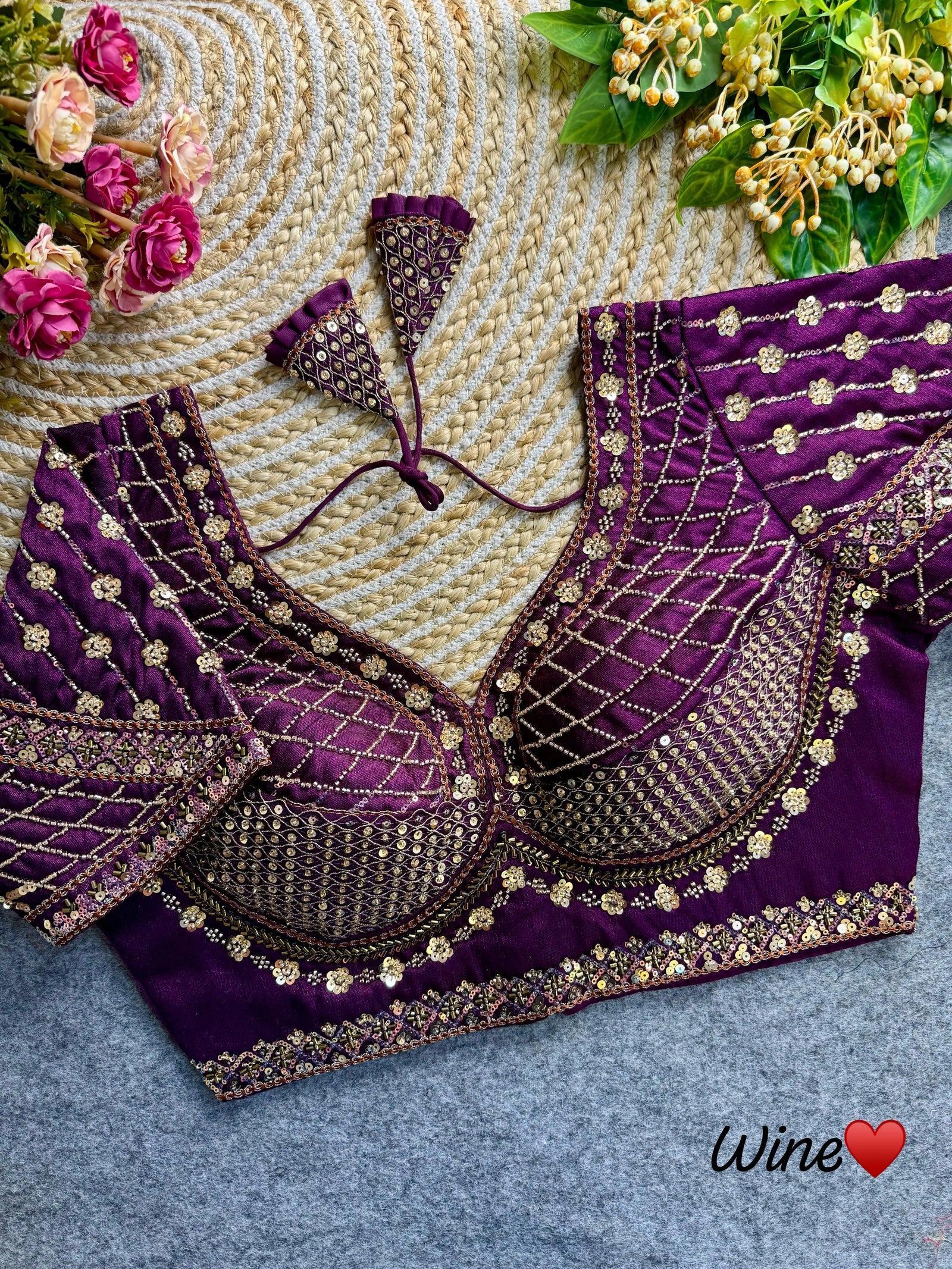 Soft purple blouse crafted from luxurious soft silk fabric, featuring intricate sequence and codding thread work.