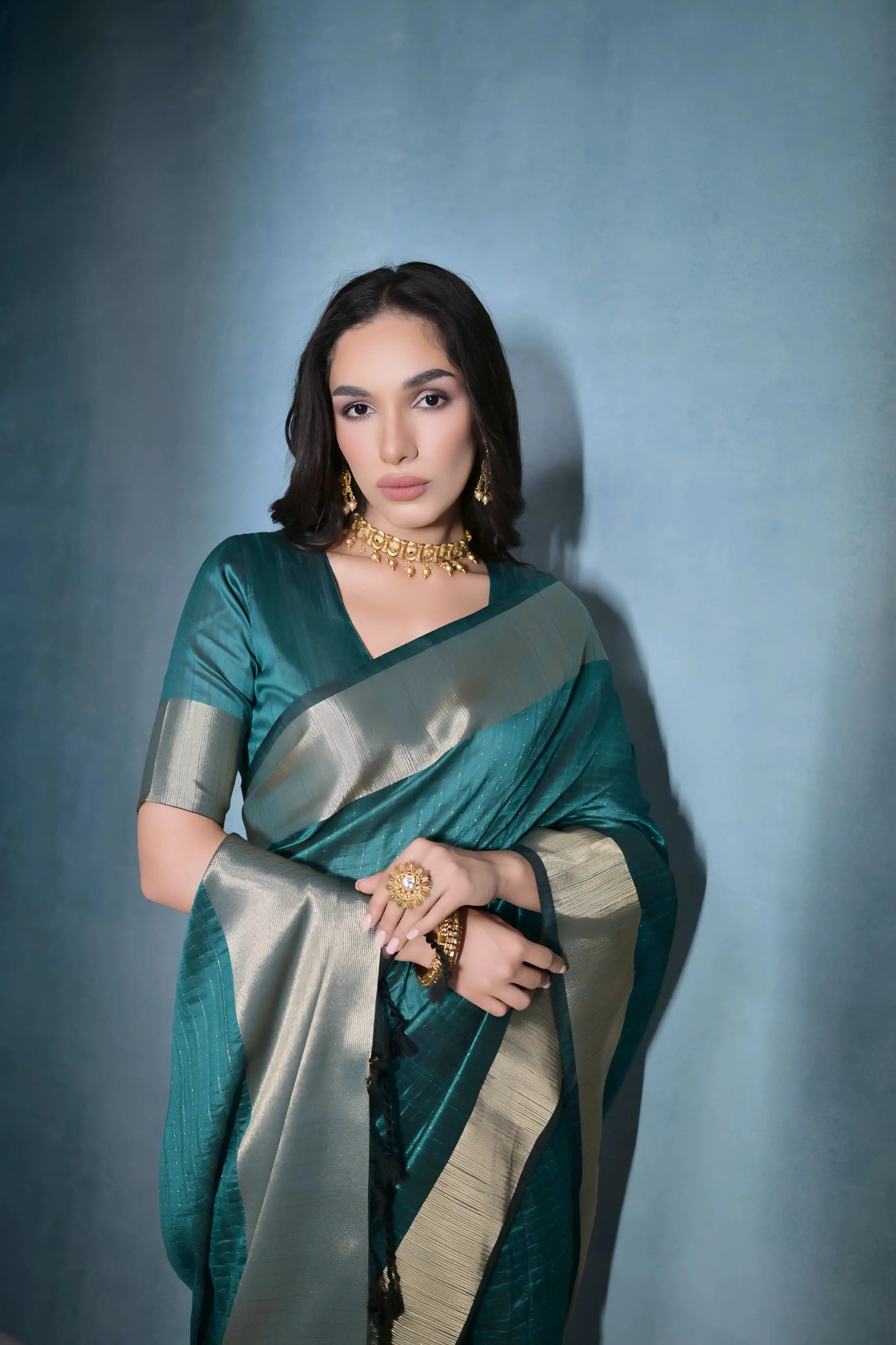Rama blue banarasi raw silk saree draped for festive occasions — Kalyanja
