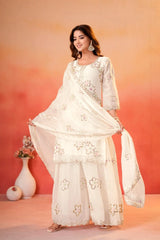 White Sequins Sharara Suit three quarter front model holding dupatta showing full set