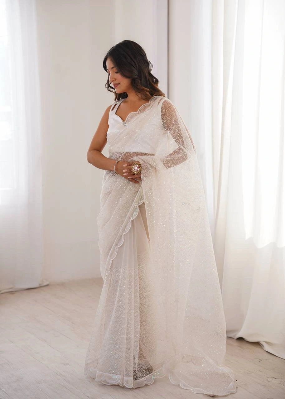 White net saree with sequin work – side view on model