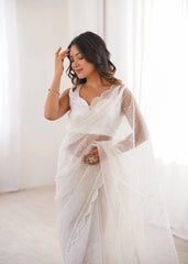 White sequins thread work saree – close pose on model