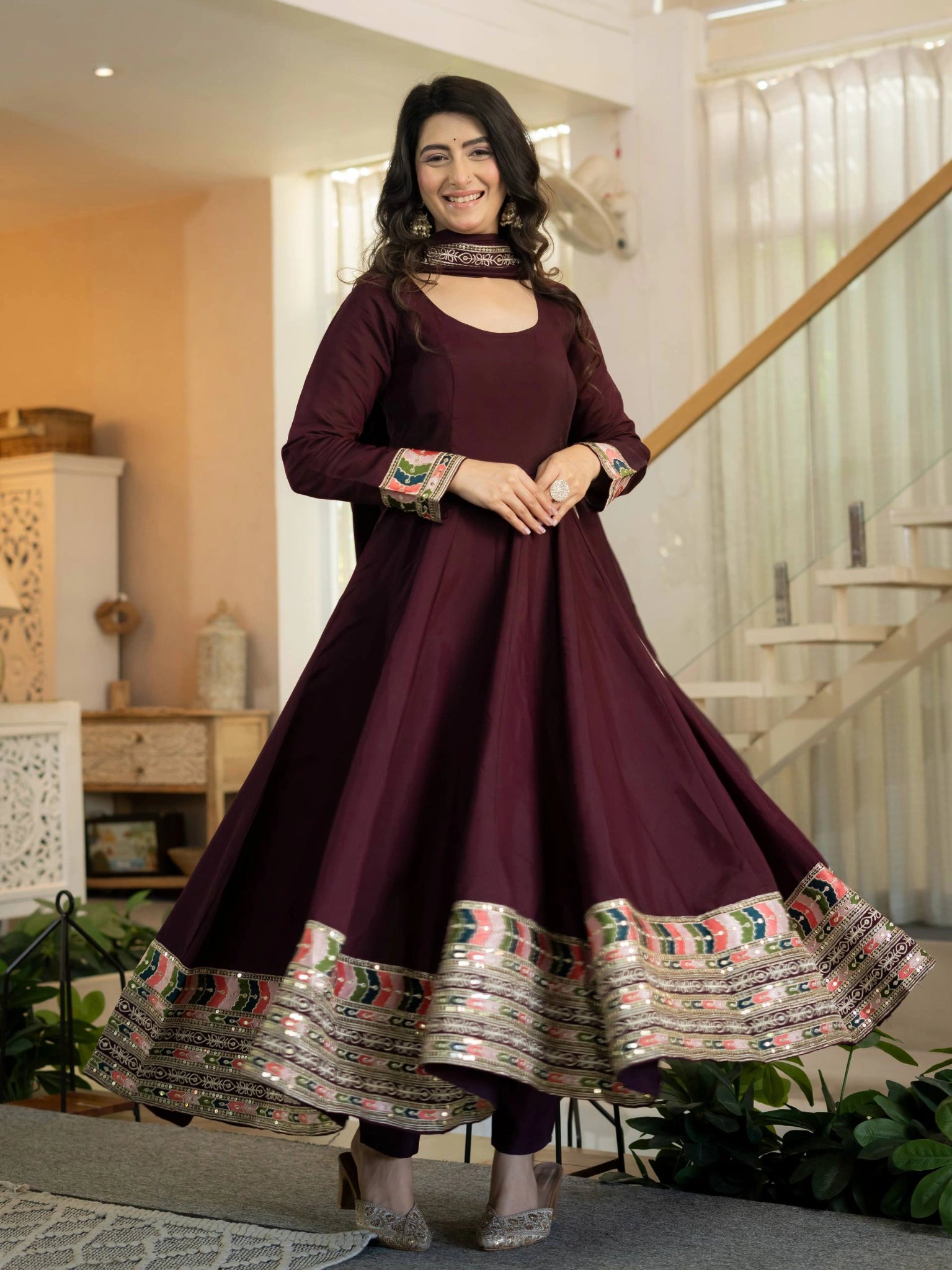 Wine Anarkali Suit spinning full flair showing colorful sequins border detail