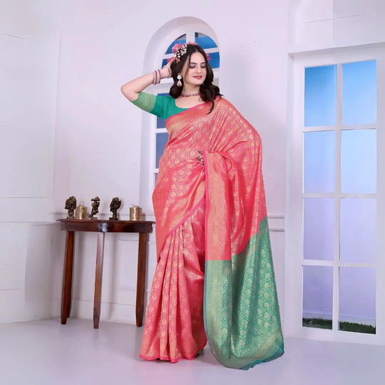 Woman Pink Silk Saree Green Pallu Golden Motifs Floral Hair Accessory Indoor