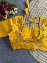 Yellow floral embroidery Banglori silk blouse with intricate design, perfect for traditional and festive occasions.