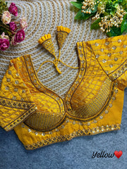 Yellow blouse crafted from soft silk fabric, featuring intricate sequence and codding thread work.