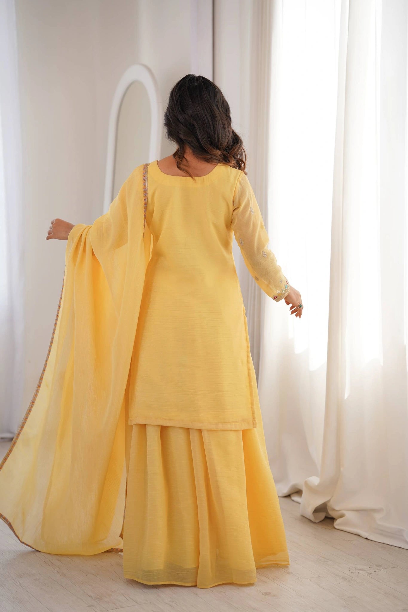 Yellow Sequins Embroidered with Thread & Zari Work Suit back view