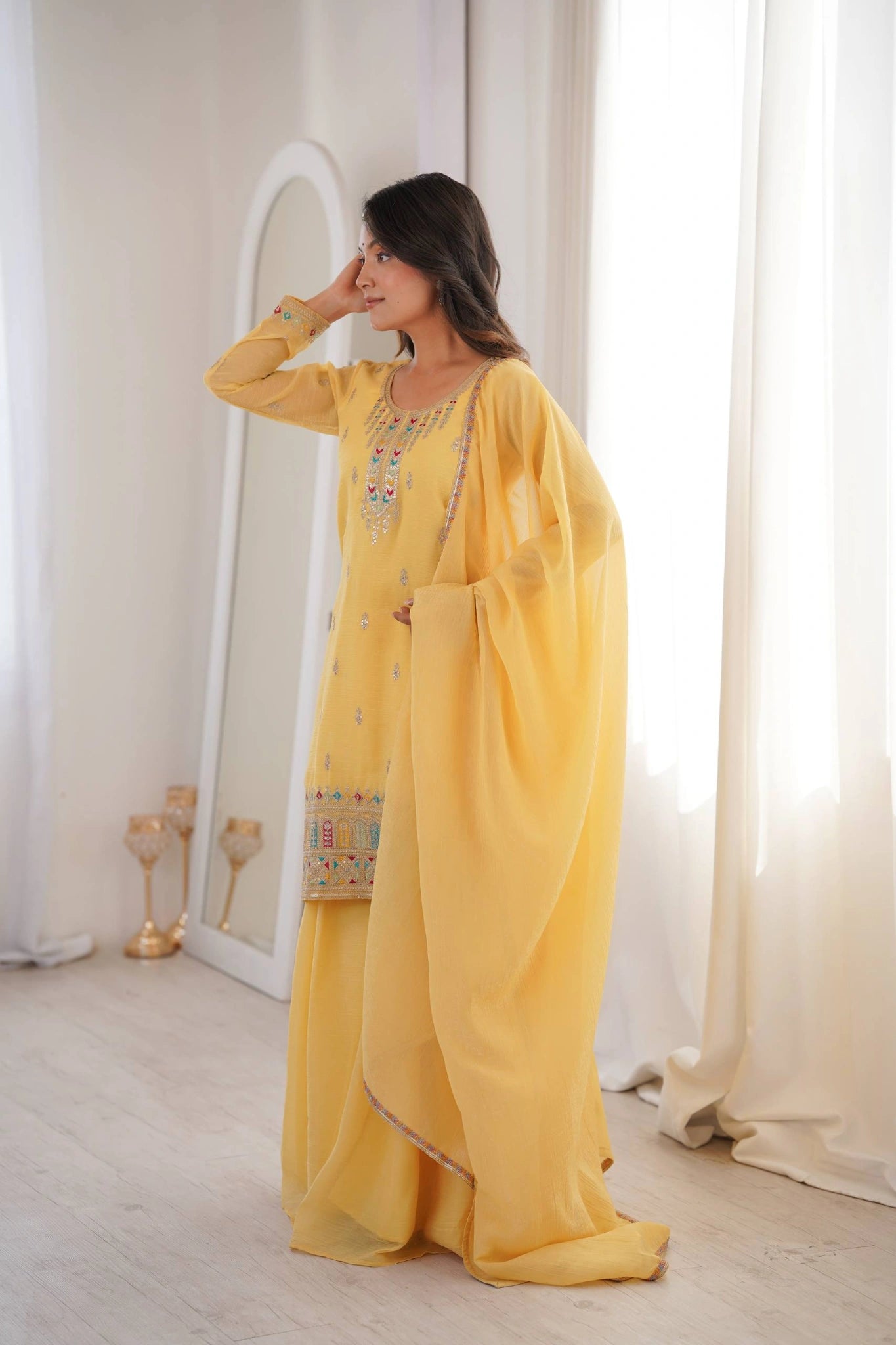 Yellow Sequins Embroidered Suit with flared sharara on model
