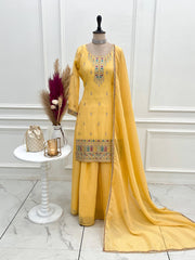 Yellow Sequins Embroidered Suit with sharara and dupatta on mannequin