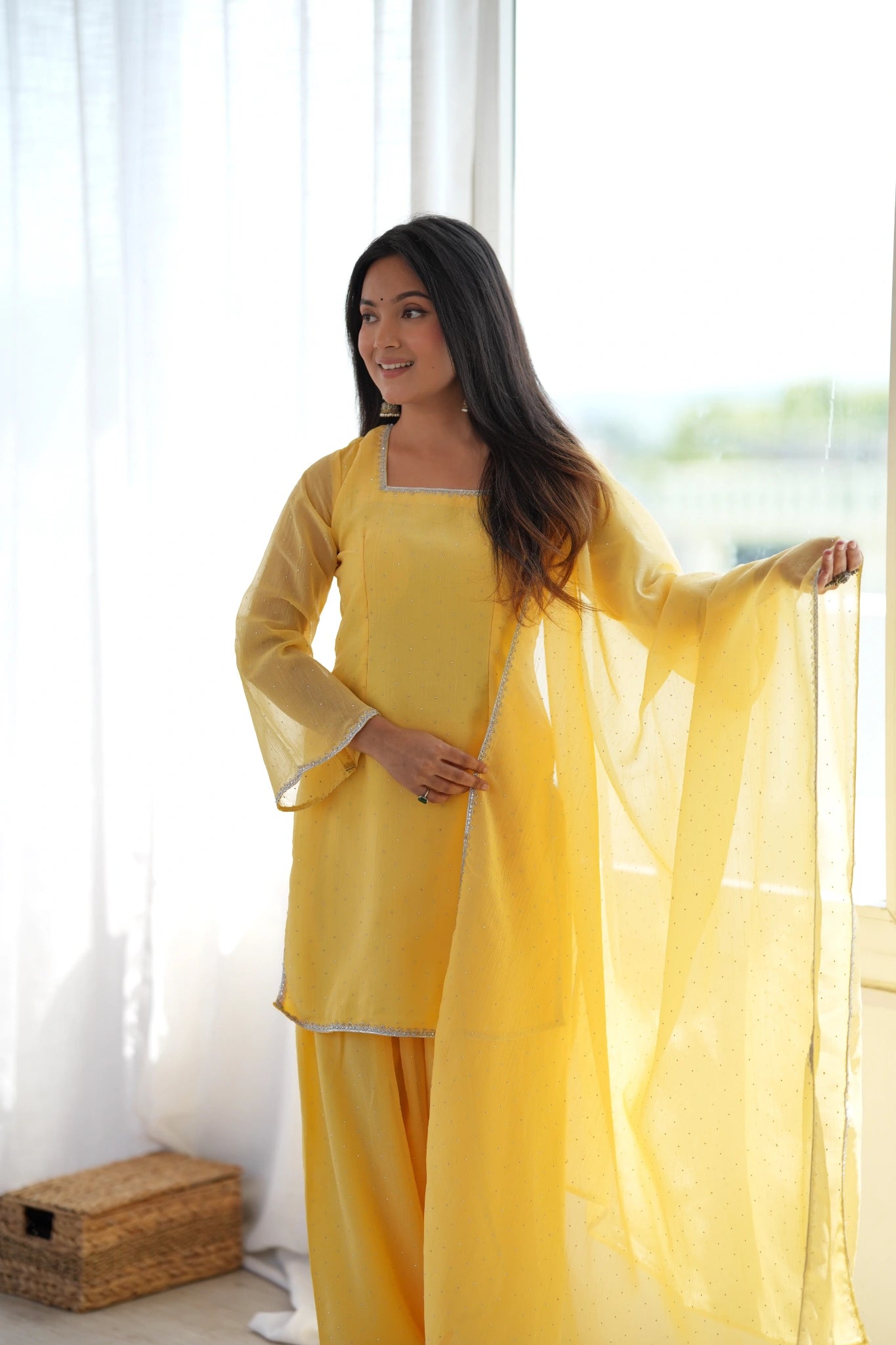 Yellow suit with lace border dupatta - side pose