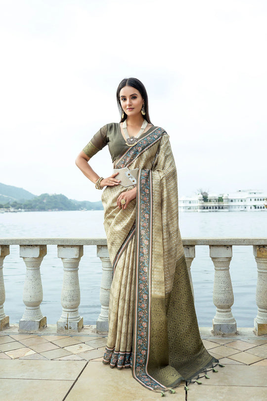 Beige Zari work soft silk saree showcasing intricate craftsmanship and elegant detailing perfect for festive and traditional occasions